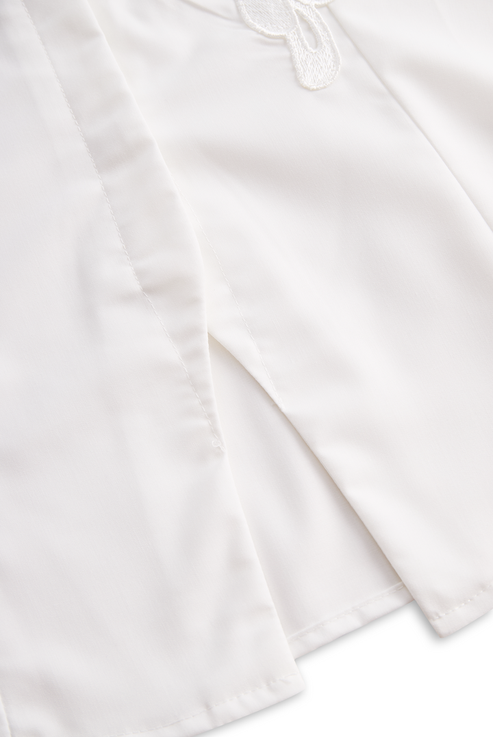 Sleeveless Shirt with 3D Floral Appliqué