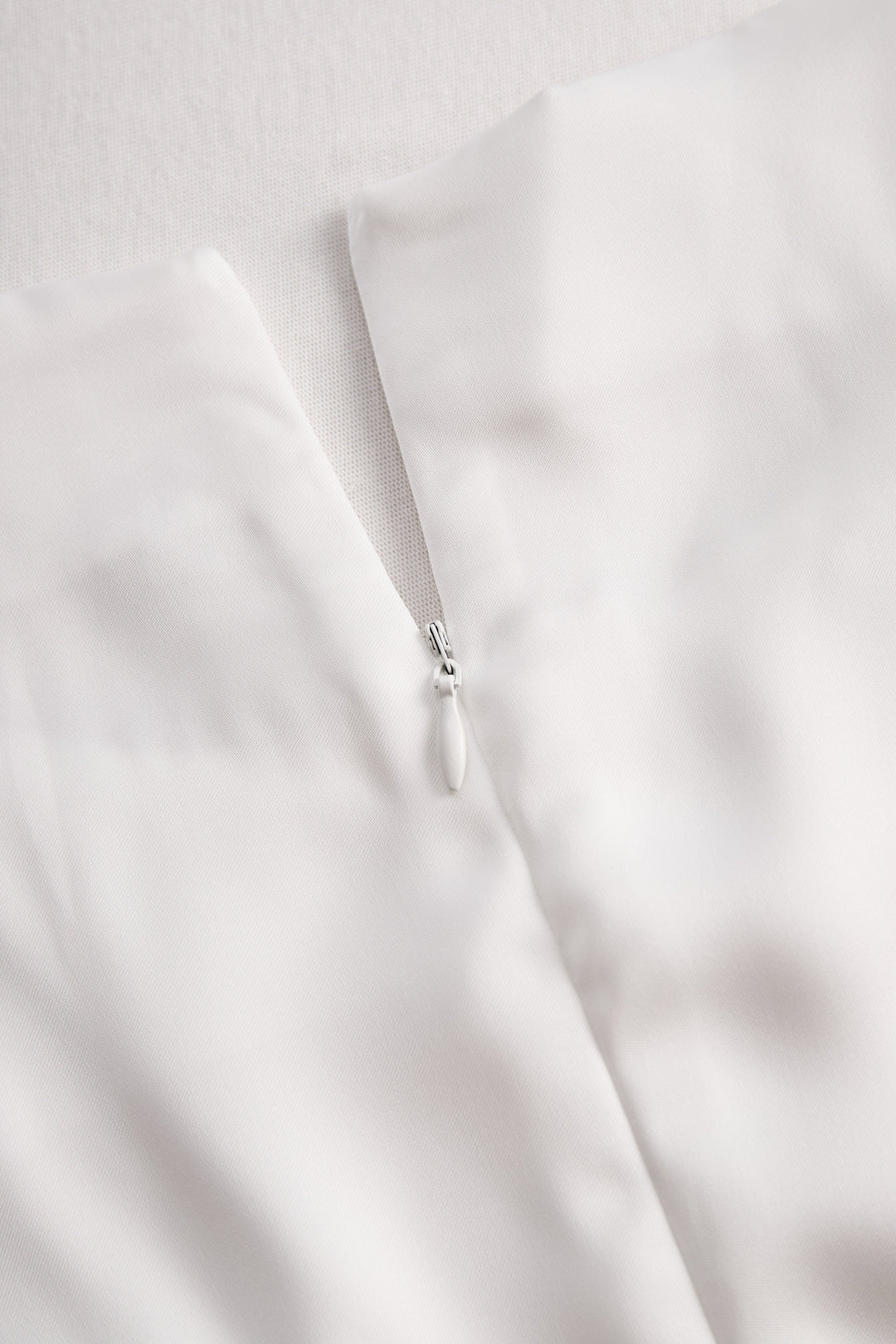 Elegant White Draped Top with Button Detail